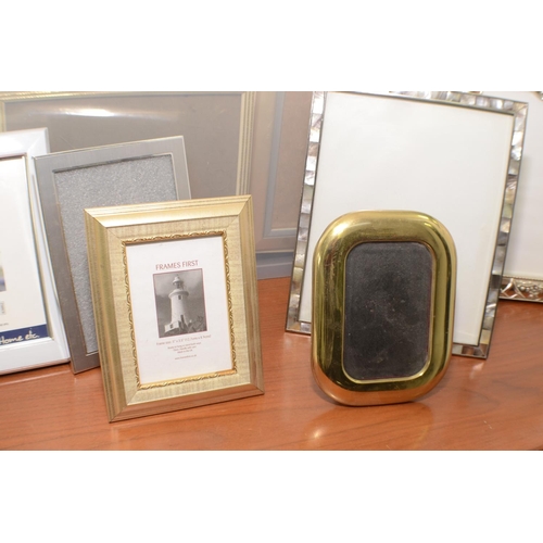 294 - A Large Selection of Photo Frames all Different sizes and styles