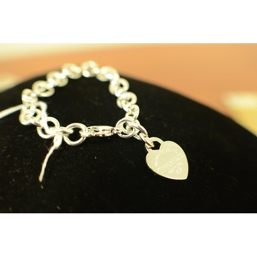 34 - A Heart Tag Bracelet on 7 inch chain marked 925 - Does Have Marking, Tiffany and Co (1024)