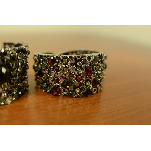 418 - A Selection of Ornate Costume Bangles with Pastel Stones