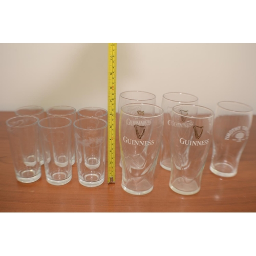 528 - 4 Guinness pint glasses, 1 Timothy Taylor pint glass and 6 glasses