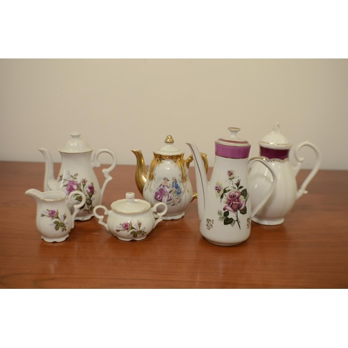 531 - Foreign Teapot, milk jug, sugar bowl plus 3 other Tea-Pots