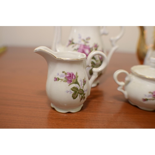 531 - Foreign Teapot, milk jug, sugar bowl plus 3 other Tea-Pots