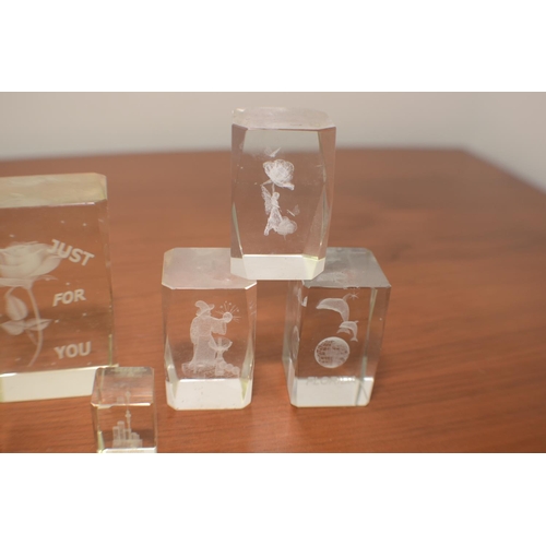 23 - A Selection of Various Sized 3D Glass Paperweights with different Designs