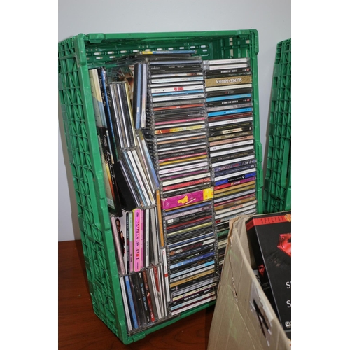 71 - A Large Selection Of Mixed Genre CD's And DVD' In 2 crates