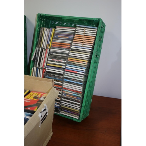 71 - A Large Selection Of Mixed Genre CD's And DVD' In 2 crates