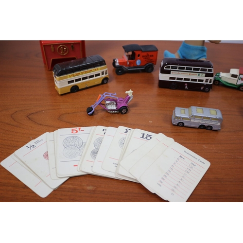 470 - Vintage toys including cars, buses,, cards etc