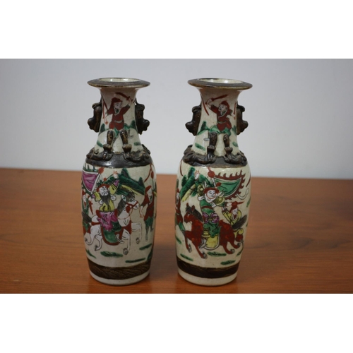 502 - Pair of believed to be antique Chinese Hand-painted crackled glaze warrior vases