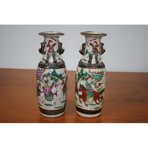 502 - Pair of believed to be antique Chinese Hand-painted crackled glaze warrior vases