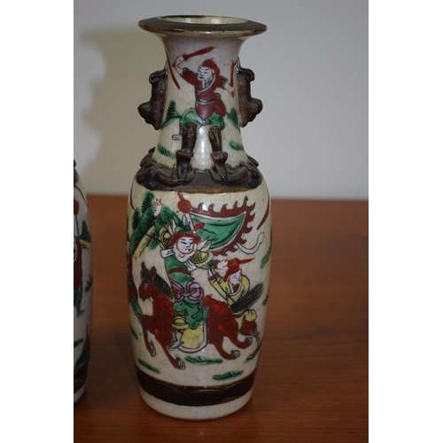 502 - Pair of believed to be antique Chinese Hand-painted crackled glaze warrior vases