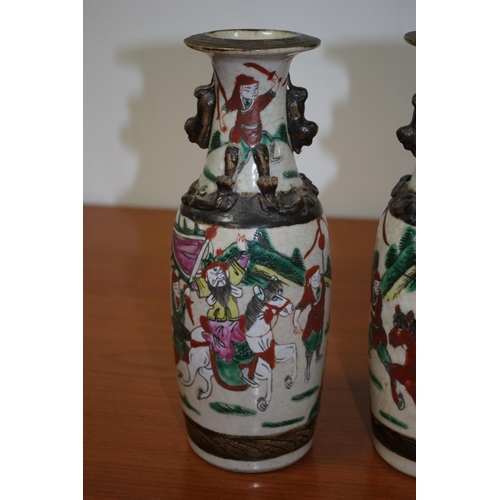 502 - Pair of believed to be antique Chinese Hand-painted crackled glaze warrior vases