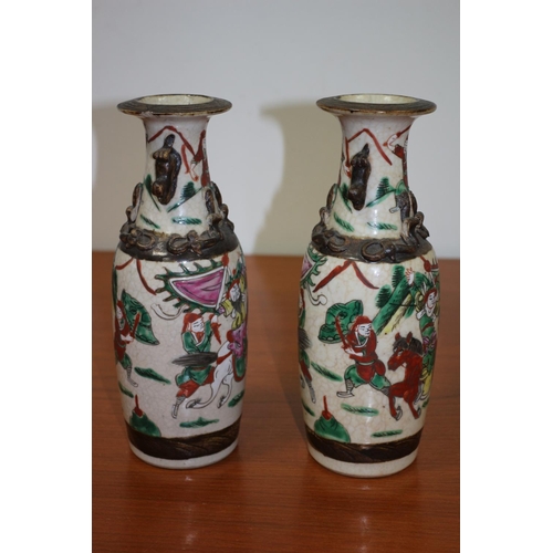 502 - Pair of believed to be antique Chinese Hand-painted crackled glaze warrior vases