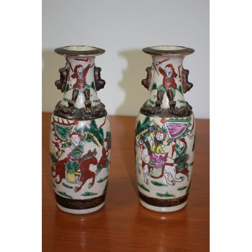 502 - Pair of believed to be antique Chinese Hand-painted crackled glaze warrior vases