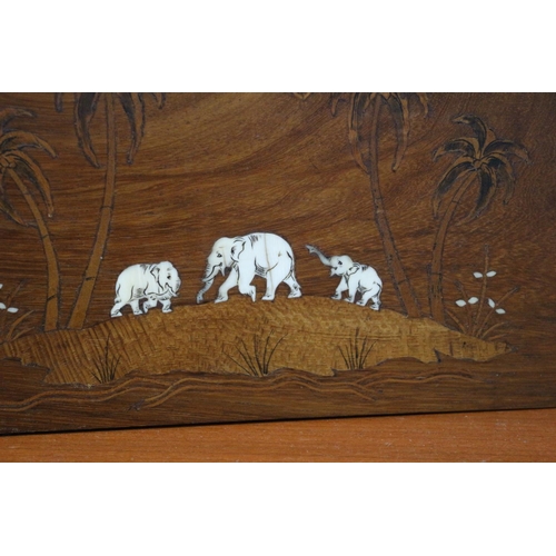 532 - Wooden plaque with inlaid elephants 23x15cm