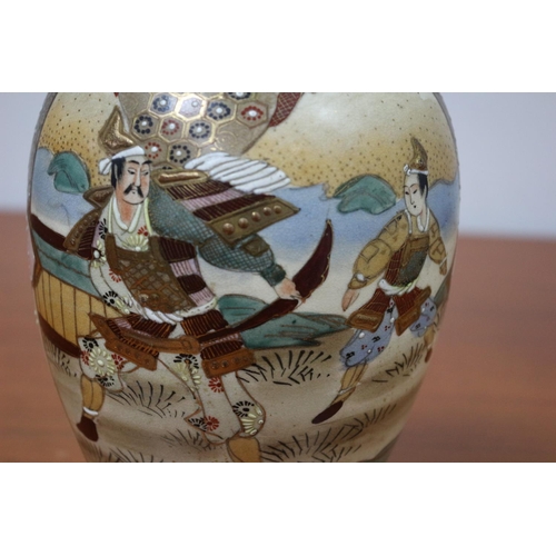 543 - Aged Japanese Satsuma Vase depicting warriors. 24 cm