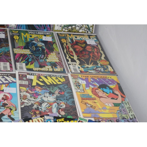 548 - A collection of Marvel Comics including 'Morbius', 'X-Men. All boarded and bagged. (US). Good condit... 