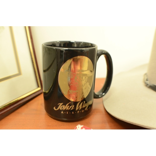 151 - A great  John Wayne Lot including a Mug 22k Gold painted, Framed and Glazed Print, Hat 2 handkerchie... 