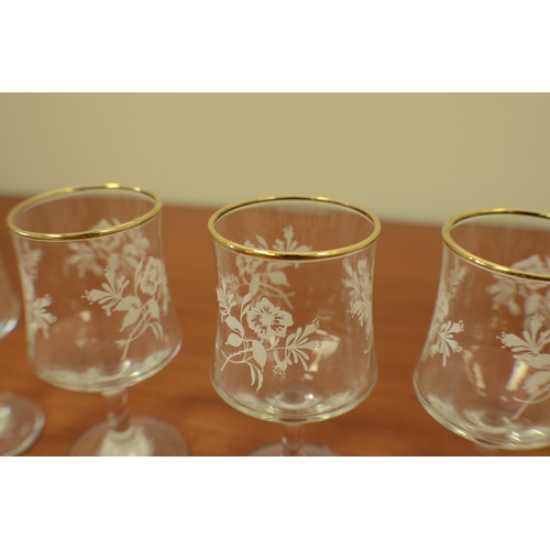 166 - 6 Sherry/Port Glasses with White floral pattern and gold Coloured rim