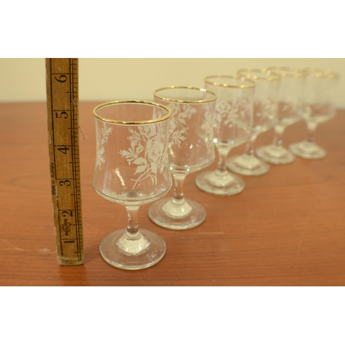 166 - 6 Sherry/Port Glasses with White floral pattern and gold Coloured rim