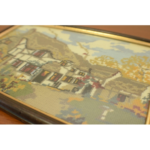 185 - Framed and Glazed Tapestry of a Country Cottage 39x26cm