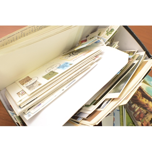 329 - A Box of Stamps, Post Cards aged and 2 Trade Card Catalogues