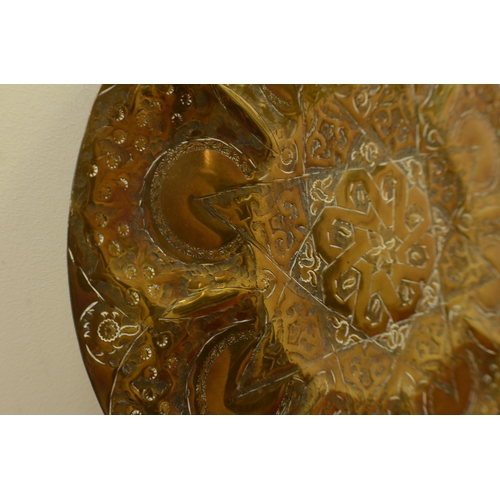 333 - A hand Beaten Eastern Style Copper Plate with Hole for Hanging