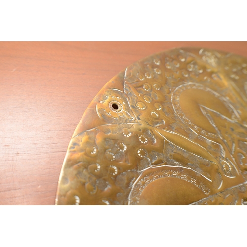 333 - A hand Beaten Eastern Style Copper Plate with Hole for Hanging