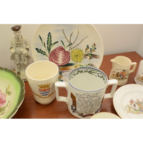 379 - A large selection of plates, cups and other items.