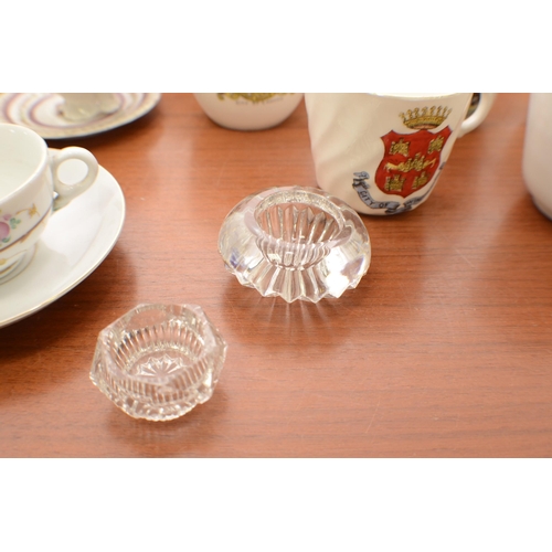 379 - A large selection of plates, cups and other items.