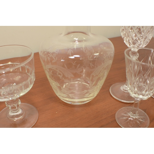 396 - A large selection of crystal glasses and other glassware