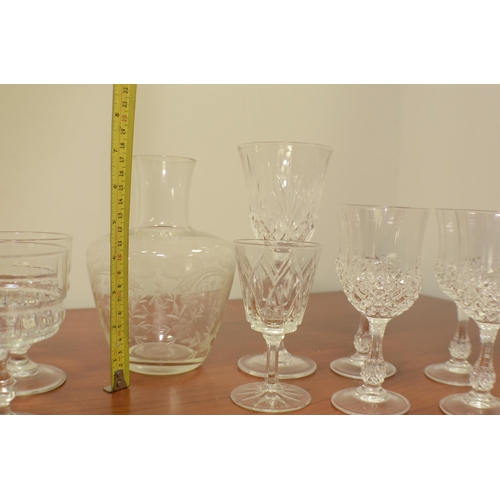 396 - A large selection of crystal glasses and other glassware