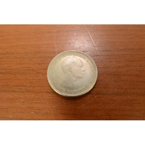 424 - Believed to be a Ten Shillings Ghana 1958