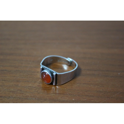 240 - Presented as Silver 925 Marked Adjustable Ring with Orange Stone