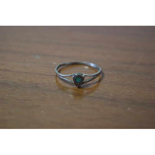 252 - Presented as 9k Marked Ring with Green Stone Set in Tear Drop