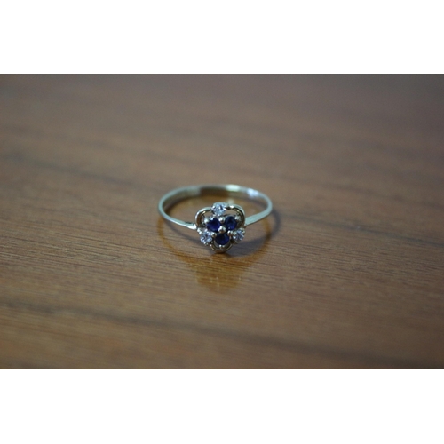 255 - Presented as a 9k Ring with Triple Blue and White Stones (possibly sapphire and diamonds)