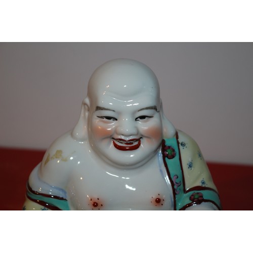 48 - A Chinese Hand Painted Enamelled Porcelain Seated Buddha Figure, Brightly Coloured - 15cm Tall