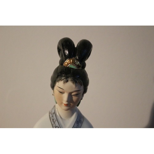 52 - Porcelain Standing Geisha Figure Holding a Scroll and Pen - 31cm Tall