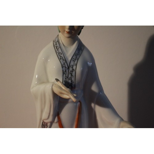 52 - Porcelain Standing Geisha Figure Holding a Scroll and Pen - 31cm Tall