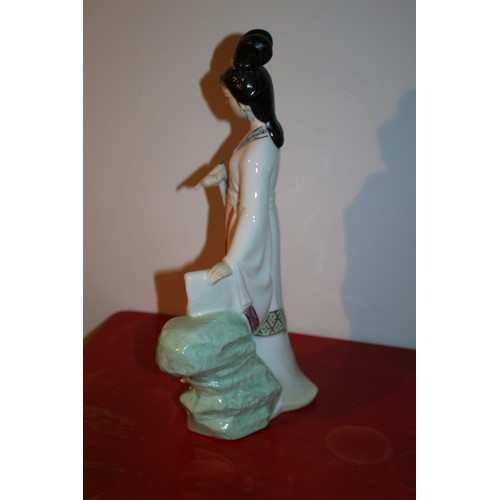 52 - Porcelain Standing Geisha Figure Holding a Scroll and Pen - 31cm Tall