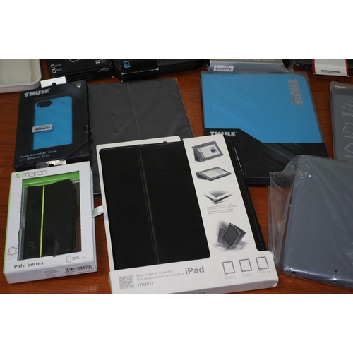 205 - A Large Collection of Phone and iPad Cases, Most Brand New including Leather Examples