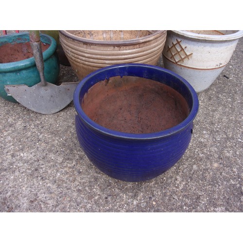 439 - A Selection of various garden pots Plus a fork and edging tool