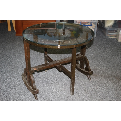 480 - Oriental highly decorative glass tilt top table with ornate wooden stand