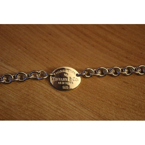 130 - Marked Tiffany & Co 925 Disc Bracelet