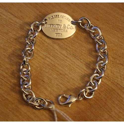 130 - Marked Tiffany & Co 925 Disc Bracelet