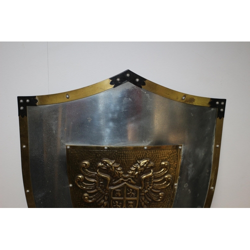 273 - A Well Made, Heavy Metal Medieval Knights Shield with Brass Edges and Central Eagle Coat of Arms Emb... 