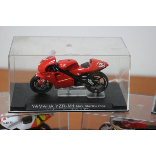 339 - 8 x Die Cast Boxed Models of Famous Motorcycles Ridden by Famous Riders - Over £80 Worth