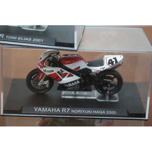 339 - 8 x Die Cast Boxed Models of Famous Motorcycles Ridden by Famous Riders - Over £80 Worth