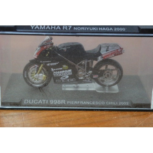 339 - 8 x Die Cast Boxed Models of Famous Motorcycles Ridden by Famous Riders - Over £80 Worth