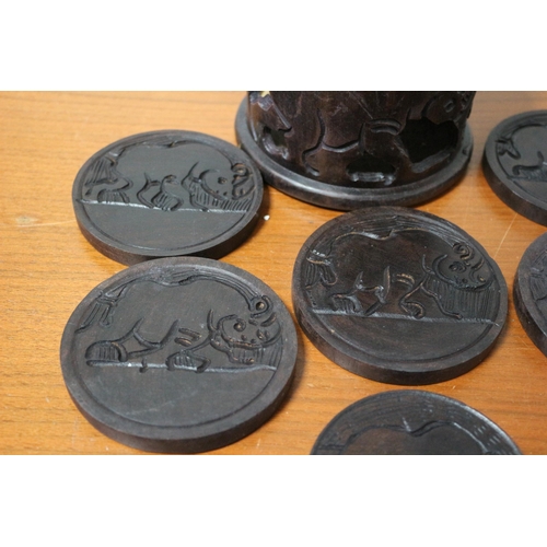 382 - African Hand Carved Depicting a Rhino Hard Wood Coaster Holder with Coasters