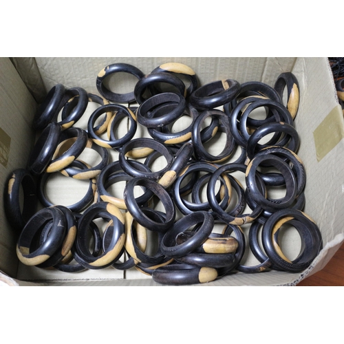 388 - Large Quantity of Quality Hand Made Wooden Bangles, Necklaces and Bracelets in a Box