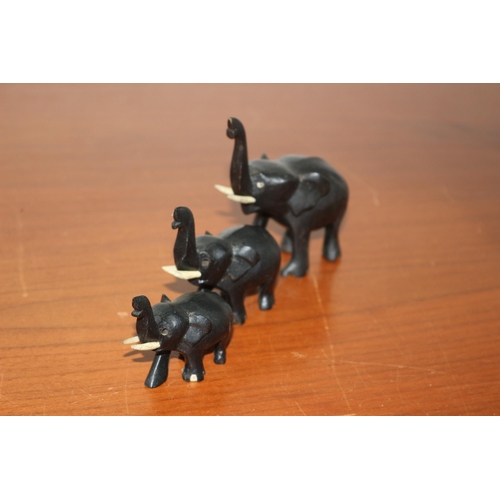 394 - Vintage Set of 3 Carved Wood Elephants with Raised Trunks